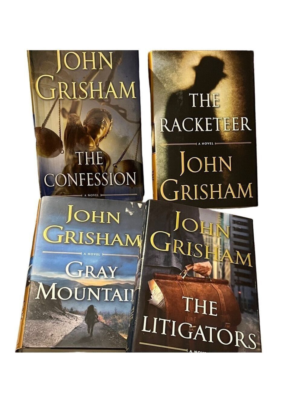 John Grisham Hardcover Book Set - Blue, Black, Gray Covers